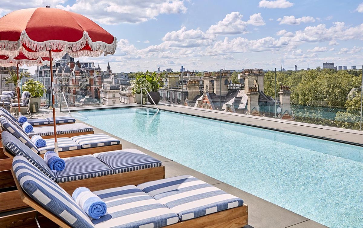 Swimmer relaxing in heated rooftop pool in London