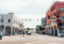 Visit LA Photo by Martin Péchy: https://www.pexels.com/photo/letters-hanging-on-string-2763964/
