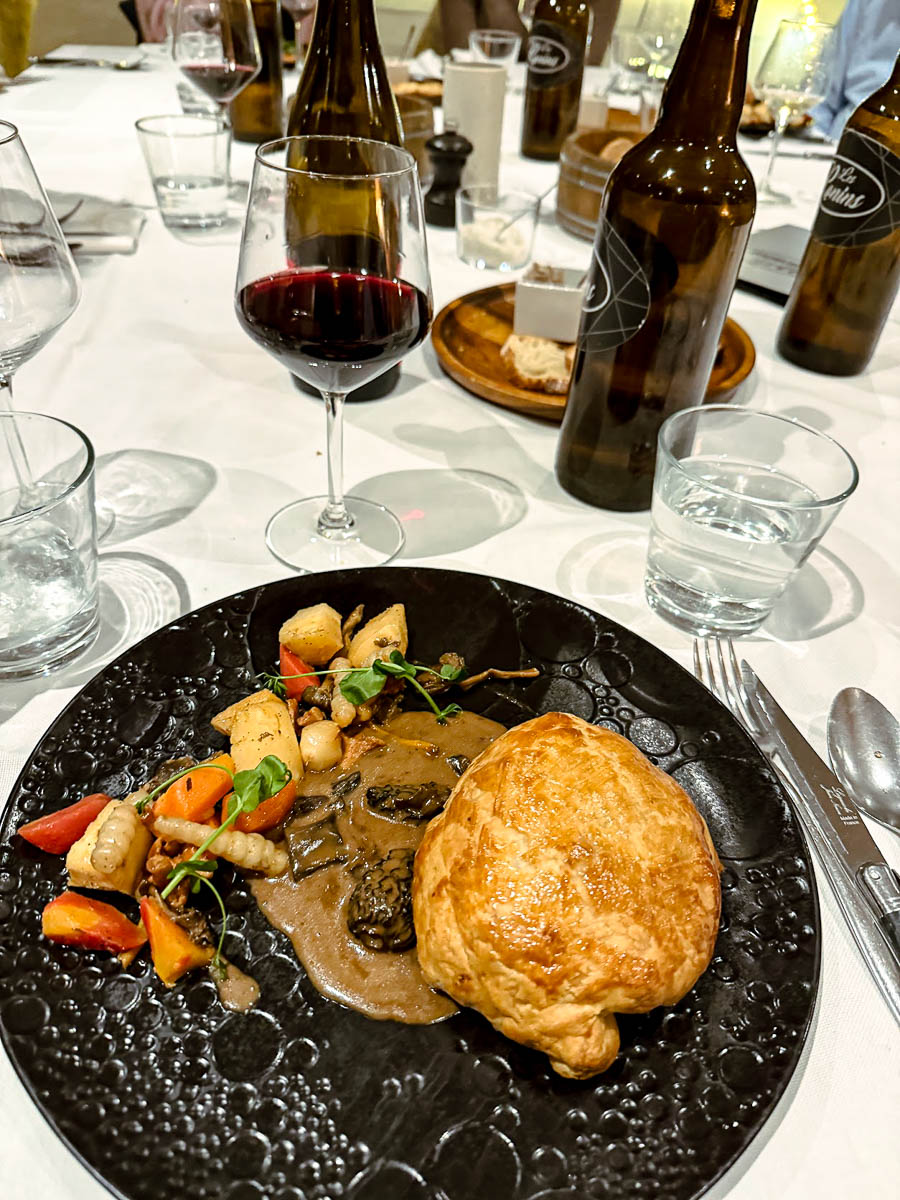 a pie and vegetables on a plate in Haute Savoie Mont Blanc
